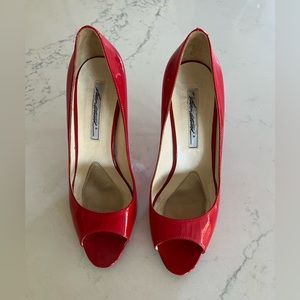 Brian Atwood red patent leather open toe pump. Size 39.